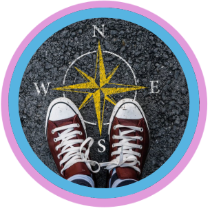 Feet wearing sports shows on a compass rose